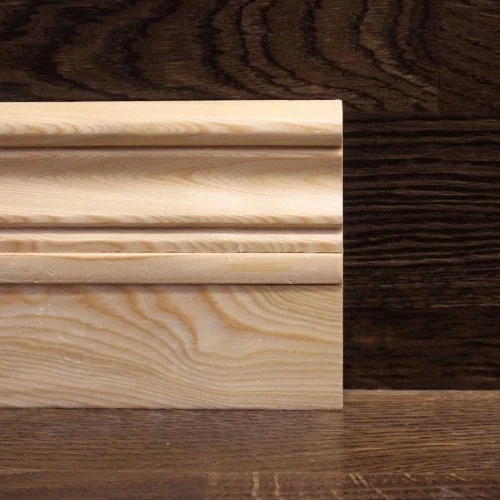 Плинтус массивный Лиственница 100x18 мм фигурный на otdelka1.ru